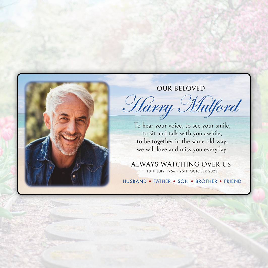 Memorial plaque for a gentleman with a beach ocean theme design, including his details and a heartfelt poem, set against a garden backdrop. Created by Orchid Memories
