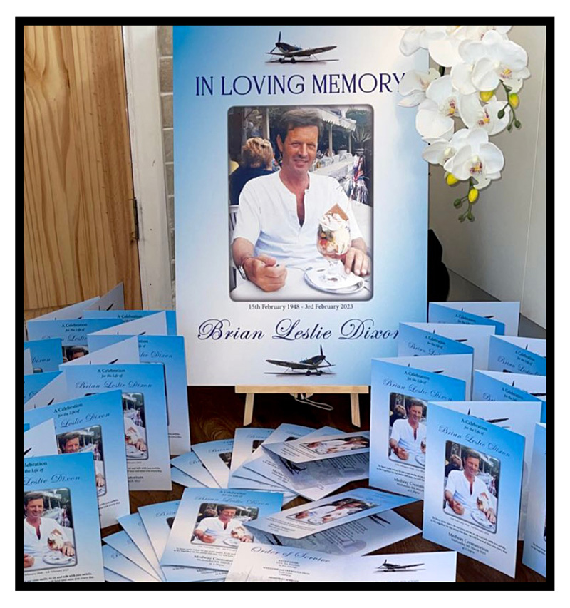 Photo of a funeral photo board and funeral order of service booklets featuring a blue colour scheme and a Spitfire plane to represent the gentleman's love of flying. Created by Orchid Memories